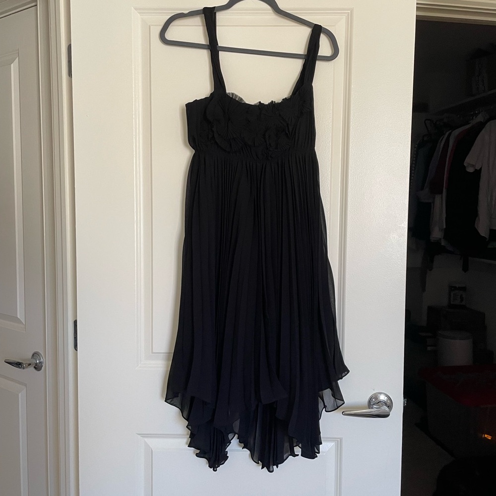 Elegant Black Strapless Dress with Flower Accent